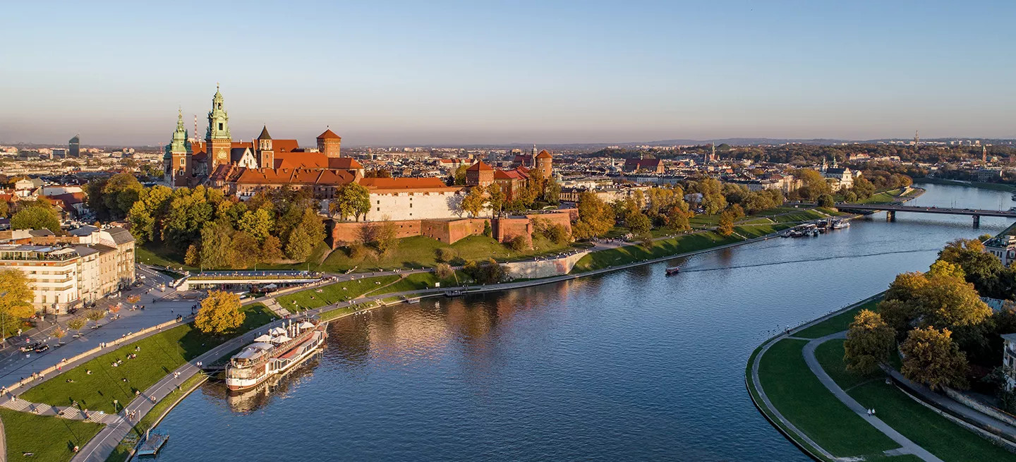 A view of Wawel Castle and the Vistula River in Kraków, Poland.