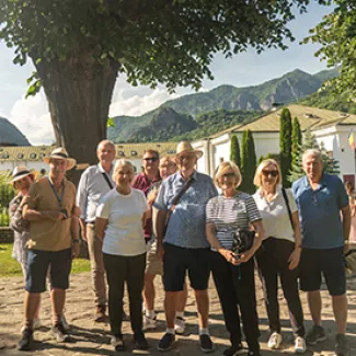 Guests posing for a photo on a group tour.